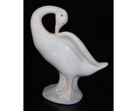 A Lladro figure of a goose, with neck arched, marked beneath, 11cm H.  (boxed)
