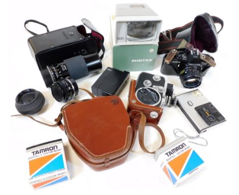 A quantity of camera equipment, to include a Pentax ME Super with lens, a Tamron lens, a Bolex cine camera, etc. 