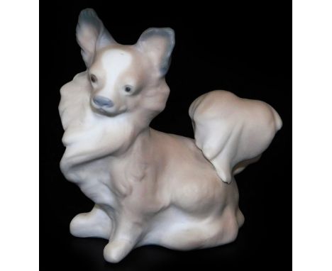 A Lladro figure of a chihuahua, matt finish, printed marks beneath, 7cm H.