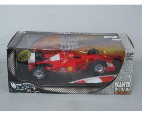 A 2001 Mattel Hot Wheels, boxed Ref No 56133 1:18 scale "King of Rain F2001 Michael Schumacher Ferrari: model appears to be u