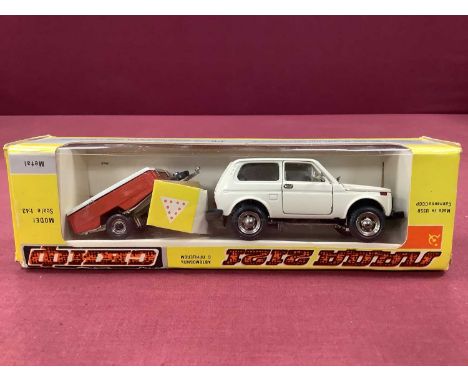Russian 1:43 Diecast Model of Lada and Trailier, boxed, c. 1982, overall very good, excellent.