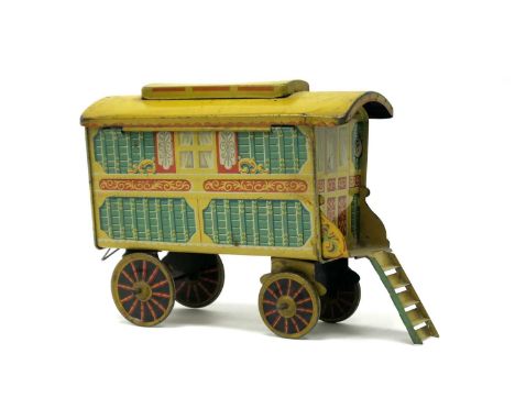 A Mid XX Century  Tinplate Gypsy Caravan by Chad Valley, complete with tun hook and hinged roof.