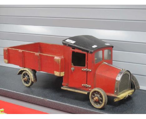 A First Half XX Century Home Crafted Model Made Out of Wood and Metal of a Four Wheel Lorry, circa 25" long, an interesting p