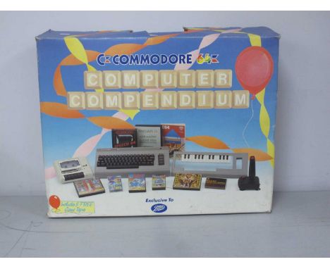 Retro Technology: A Commodore 64 Home Computer. Accessories include Data Recorder, Music Maker, Speech 64, Light Pen, Joystck