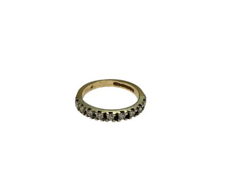 9ct gold diamond half eternity ring set with nine brilliant cut diamonds (Birmingham 1980), size M

Weight 2.4 grams