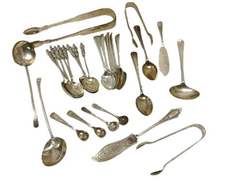 Set of eight Edwardian silver apostle teaspoons, (Birmingham 1901), together with other silver teaspoons sugar tongs and flat