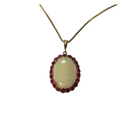 Large oval opal and synthetic ruby pendant in a yellow metal mount on a gold plated box link chain, 41.5cm longThe pendant is