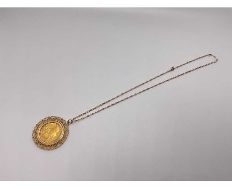 Victorian gold full sovereign, 1886, in gold pendant mount on chainTotal weight 13.4g.
