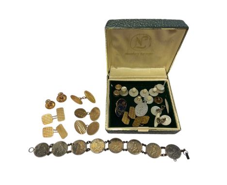 Two pairs of 9ct gold cufflinks, one 15ct gold cufflink, two 9ct gold studs, other cufflinks, studs etc and a silver coin bra
