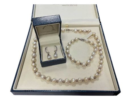 Pair of cultured pearl and diamond earrings in 9ct white gold setting, together with a freshwater cultured pearl and silver n