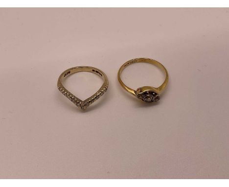 1920s three stone ring in 18ct cross-over setting, size K 1/2, and a 9ct gold diamond wishbone eternity ring, size H (2)18ct 
