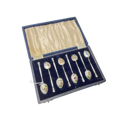 Set of eight 1950's silver and enamel coffee spoons, each with hand painted floral decoration, in a fitted case, (Birmingham 