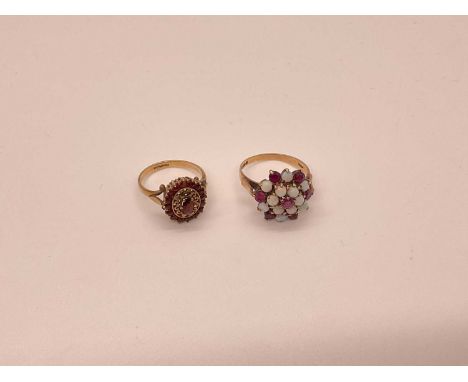 Opal and ruby cluster ring in 9ct gold setting, London 1976, size P, and a 9ct gold garnet cluster ring, size M 1/2 (2)Total 