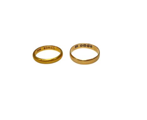22ct gold wedding ring (London 1953) size I½ and an 18ct gold wedding ring (Birmingham 1900), size O22ct gold ring weighs 3.3