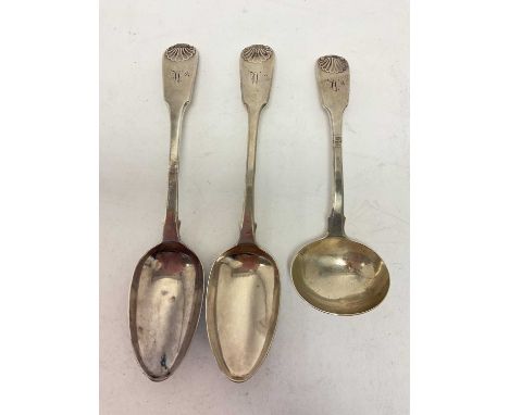 Two George III silver fiddle and shell pattern table spoons, and a matching sauce ladle (London 1817, 1820 &amp; 1821), maker
