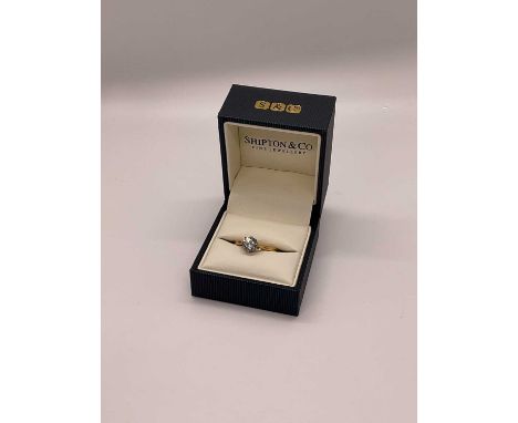 Diamond single stone ring with a brilliant cut diamond estimated to weigh approximately 0.75cts in platinum claw setting on 1