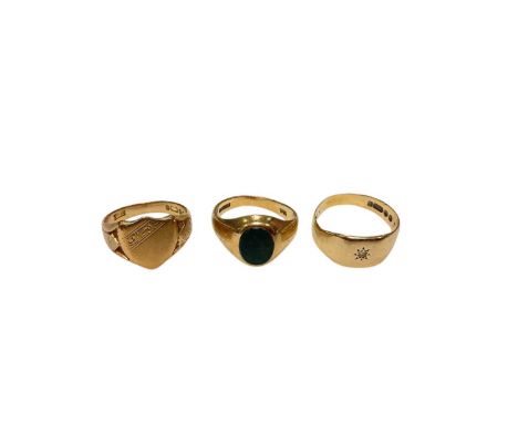 Three 9ct gold signet rings to include shield shaped plaque, size P, bloodstone oval panel, size P and a single stone gypsy s