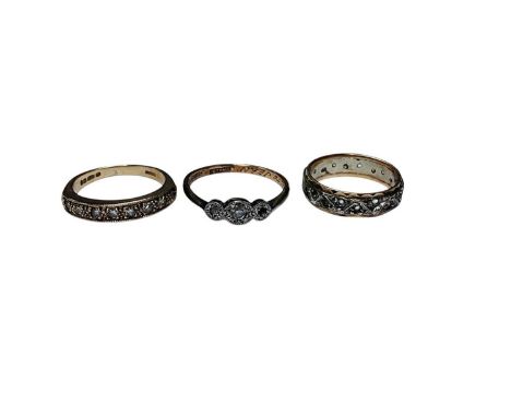 9ct gold diamond set half eternity ring, one other 9ct gold diamond set ring and a yellow metal synthetic stone eternity ring