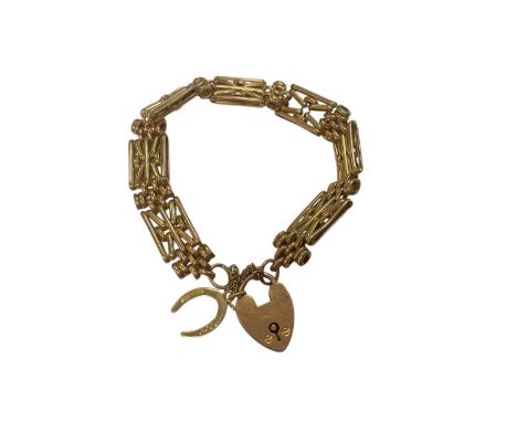 9ct gold gate bracelet with padlock clasp, with an 18ct gold horseshoe charmWeight 18.1 grams