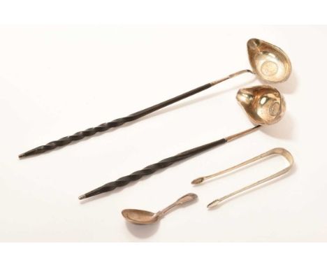 Two silver punch ladles with twisted handles, one containing George II coin, one containing George III coin, together with Ge