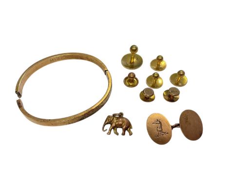 Group of gold jewellery to include four 18ct gold studs, three 9ct gold studs, one 9ct gold cufflink, 9ct gold elephant charm