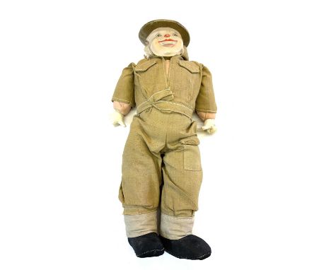 Porcelain faced doll / puppet formed as a WWII British Infantry Soldier with Tommy helmet.Length approximately 32cm.