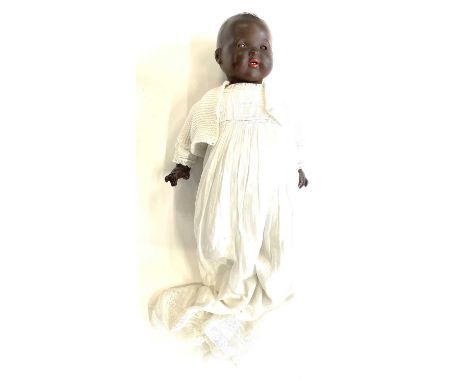 An early 20th Century Armand Marseille (Germany) black bisque head doll. Marked to the neck 351/8.K