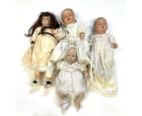 A mixed lot of baby dolls to include: - Armand Marseille bisque head doll, marked to neck 518/5.K - Plastic head doll, marked