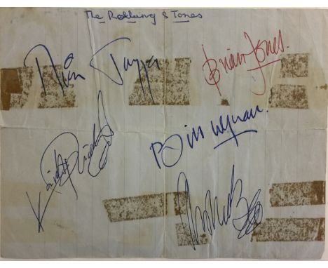 ROLLING STONES SECRETARIAL SIGNED PAGE. A piece of lined paper bearing signatures in various inks from Mick Jagger, Keith Ric