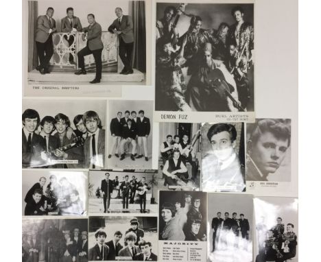 60 PHOTOS AND FLYERS.To include a selection of photographs of various 1960s bands including Demon Fuzz, The Hollies, The Roll