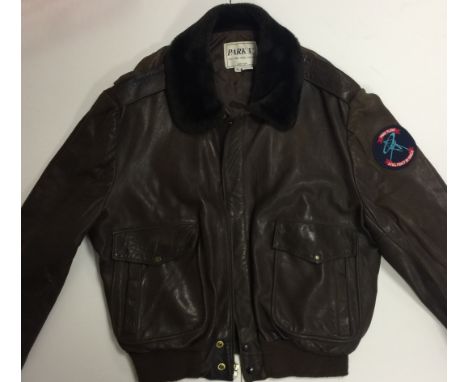 PINK FLOYD LEATHER CREW JACKET. A leather jacket from 1987 from Pink Floyd's 'A Momentary Lapse In Reason' tour. Patch on lef