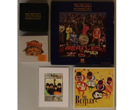 BEATLES/ROLLING STONES CD/7". To include 16 items: The Beatles CD Singles Collection (CD BSCP 1), On Compact Disc - Sgt. Pepp