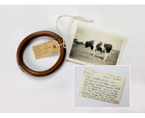 COPPER BULLRING. A vintage wrought copper bullring by Hiatts. An accompanying photograph, c.1957, has a handwritten note by M