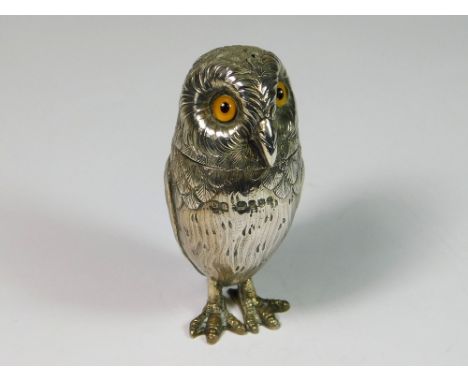 OWL PEPPERETTE. A Victorian silver, novelty Owl pepperette by Charles Boyton, the removable head with glass eyes. Stamped hal