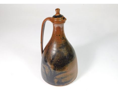 BERNARD LEACH. A Bernard Leach, Leach Pottery tenmoku glazed carafe & stopper. Personal & Pottery impressed marks. Height 24c