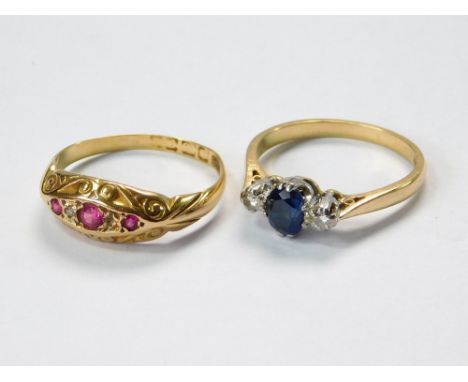 GOLD RINGS. A Victorian, 18ct. gold ring, set with three rubies & two diamond chips. Size N/O. Approx. 2g. Also, an 18ct. gol