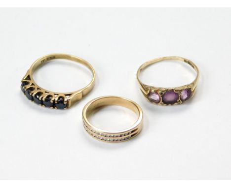 GOLD RINGS ETC. A 9ct. gold, amethyst-set dress ring, a 9k. dress ring, channel-set with two rows of small diamonds & a Germa