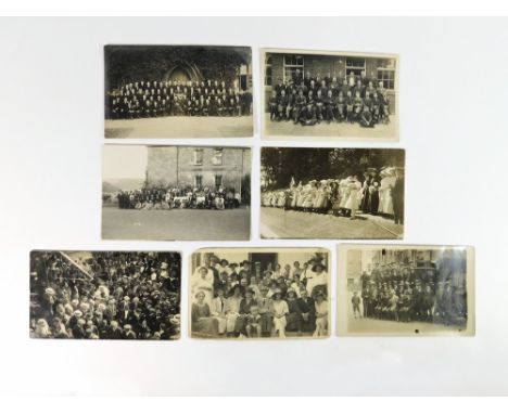 HELSTON & OTHER GROUP PHOTOGRAPHS. Seven real photograph group postcards, including two taken on the Penrose Estate, one appe
