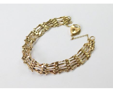 GOLD BRACELET. A 9ct. gold gate bracelet, with 9ct. gold padlock clasp. Approx. 5.4g. Condition Report: Very good.  Please no