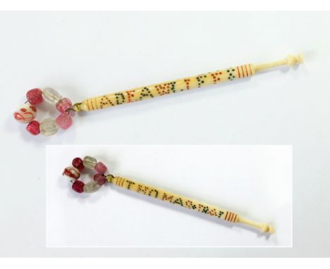 LACE BOBBINS. A 19th century turned bone commemorative/memoriam lace bobbin with the phrase, 'Adeaw (Adieu?) Life, Thomas, 18