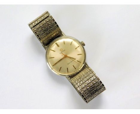 OMEGA. A gentleman's Omega Geneve, 1960's steel wristwatch with black/gold baton markers, gold hands & a sweep seconds hand. 