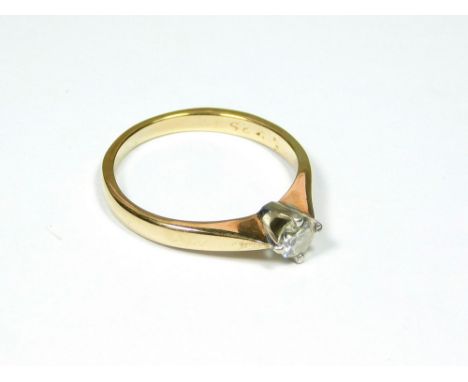 SOLITAIRE RING. A 9ct. gold solitaire diamond ring. Approx. 1.8g. Size K. Condition Report: Please request a condition report