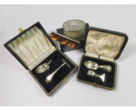 CHILDRENS CASED SETS. A 1960's silver-mounted baby's brush & comb set, cased. Also, two cased sets of silver spoon & pusher. 
