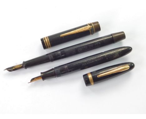 FOUNTAIN PENS. Two fountain pens: a black Dickinson 'The Croxley Pen' & a black hard rubber & vulcanite De La Rue 'Onoto The 