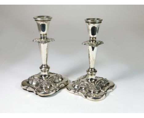 CANDLESTICKS. A pair of Victorian silver weighted candlesticks by Cooper & Co. Ltd., Birmingham 1895. Height 17.6cm. Conditio