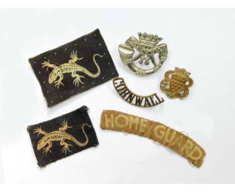 HELSTON HOME GUARD BADGES ETC. Various WWII Helston Home Guard militia badges: a Home Guard cloth shoulder title, two 'Lizard