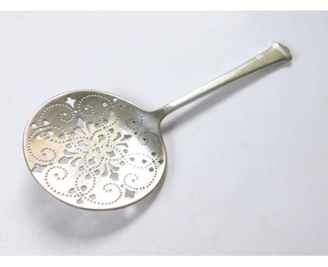 TIFFANY SPOON. A Tiffany sterling silver straining spoon. Marked 'Tiffany & Co. Sterling. Pat. 1923 & letter 'm' for John. C.