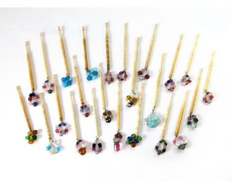 LACE BOBBINS. A variety of 19th century turned bone lace bobbins with spangles. (24 bobbins). Condition Report: Very good.  P