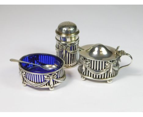 CRUET SET. A harlequin silver cruet set comprising: an oval open salt & matching pepper by Barnsley & Co., Birmingham 1901 & 