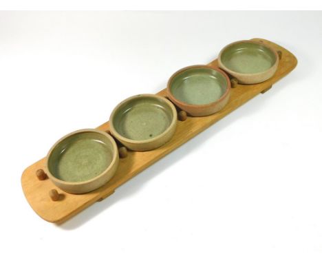  LEACH POTTERY STANDARD WARE. A scarce Leach Pottery Standard Ware set of four hors d'oeuvre dishes on an oak tray by Robin N